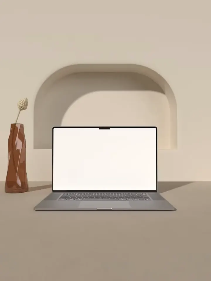 Notebook com tela em branco sobre uma mesa clara, em um ambiente minimalista